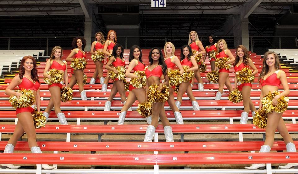 Mesquite Marshals Darling Deputies Cheerleaders in red uniforms